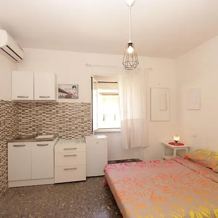Pacinotti Studio Quarto em Acomodações Particulares